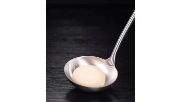 Long-handled stainless steel soup spoon
