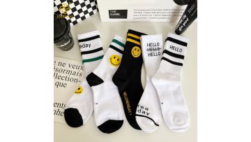 Korean version cartoon smiley face high tube socks with letter sports socks