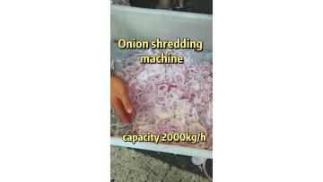 Onion shredding machine
