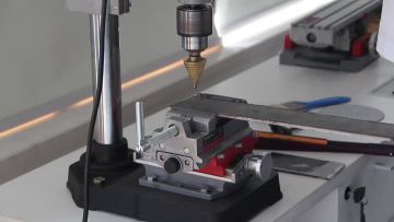 Spiral step drill