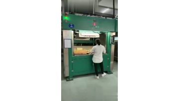 worker is working with the machine