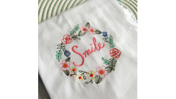Embroidered tea towel
