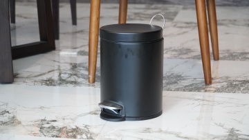 grey foot pedal trash can