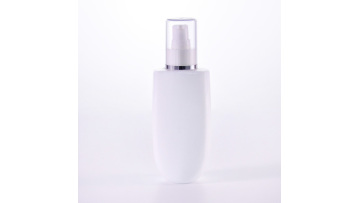 Opal white glass bottle with clear overcap 