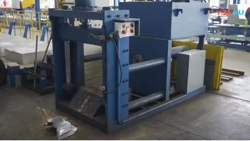 Cutting and demoulding machine