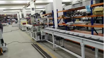 The ecomomic side sealer FL-5545TBC (customized) & customized tunnel  working with the customized conveyors  being applied to pack long tubes with POF film or PE film.