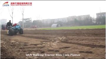 walking tractor with corn planter.mp4