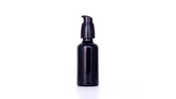 Glass bottle with black smooth lotion pump
