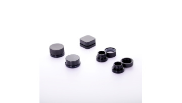 Small black cream jar with anti-theft cover