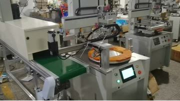 Turntable screen printing machine with IR tunnel and robot