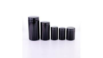 Black glass jar and bakelite lid