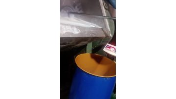 Real shot of liquid silicone rubber being taken out of the pot and loaded into the barrel