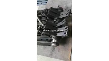 warp knitting machine springs and swinging arms
