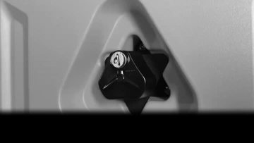 oil tank mounting bracket lock