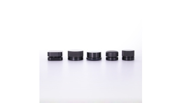 Small black cream jar with child resistant cover