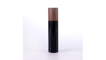 Matte black glass lotion bottle with wooden cap 