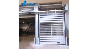 Interlocking spiral high speed door
