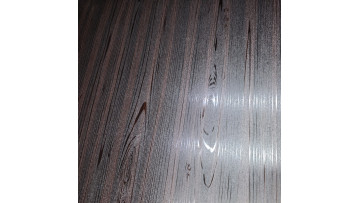 Galvanized steel with a faux black walnut finish