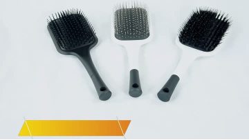 New design paddle hairbrush with nylon bristles and steel pins
