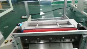 Flying Man brand desktop film roll to sheet cutting machine.mp4