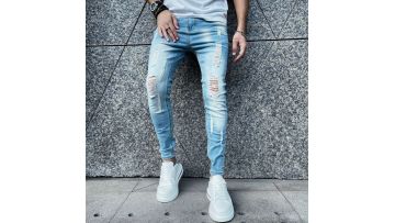 New Korean version ripped skinny slim small stacked feet youth mid-waist trousers men's black jeans1