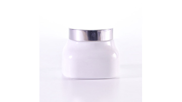 Square white glass cream jar with sliver cap