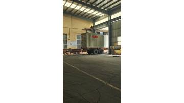 Three-tube towers for Angola are being loaded into containers for shipment.