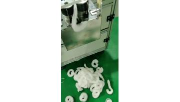 Nonwoven beard cover machine