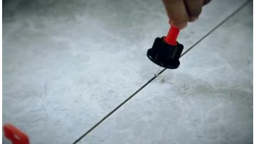 Use of tile leveler