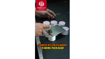 CHINESE NYLON FILAMENT IS BEING PACKAGED