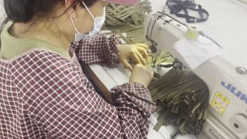 Sew on the adjustable size strap