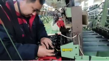 Workers operate the machines