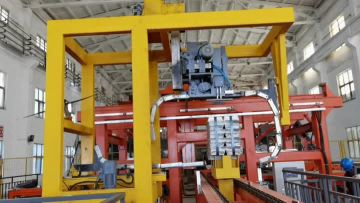 Zinc ingot strapping machine