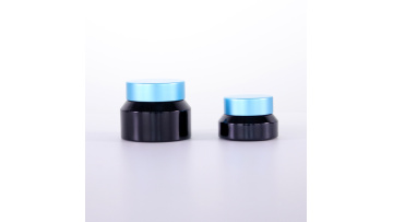 Blue sprayed black oblique shoulder cream jar