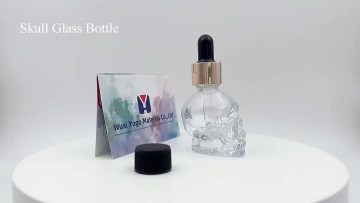 glass dropper bottle skull shaped