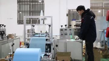 Non woven shoe cover machine