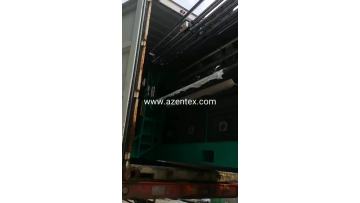 Warp knitting machine tension spring