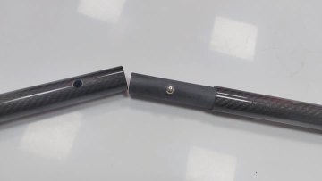 carbon fiber tube with spring button