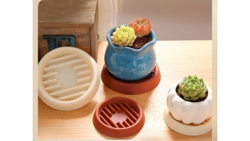 Water connected flower pot base
