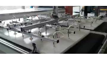 Customized line including the slope conveyor, stacking device, auto in line sleeve sealer and the tunnel  to pack the plastic board with color printed PE film