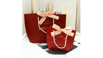 New Arrival Luxury Reusable Small Paper Wedding Gift Packaging Bag Thank You Carrier Paper Bag With Bow1