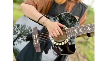 T402 student guitar