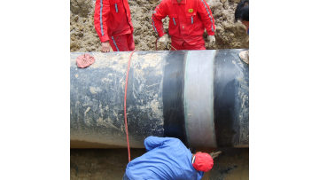 Heating adhesive surface of closure patch