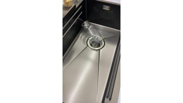waterfall sink with knife rack and cup rinser