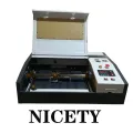 Best Sell ,Mini CO2 Laser Engraver 4040 with Lifting Platform for Cutting Mobile Phone Protector