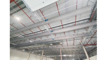What are the advantages of fabric ducts in pharmaceutical warehouses?