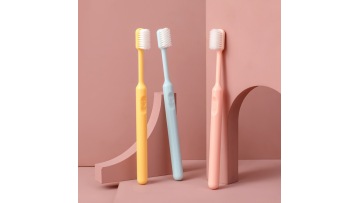 Candy colored smiley face toothbrush