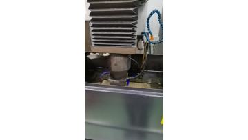 Discharge machining of die parts