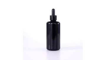 Black round shoulder glass bottle for essential oil 