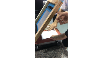 Embossing machine for finished T-shirt